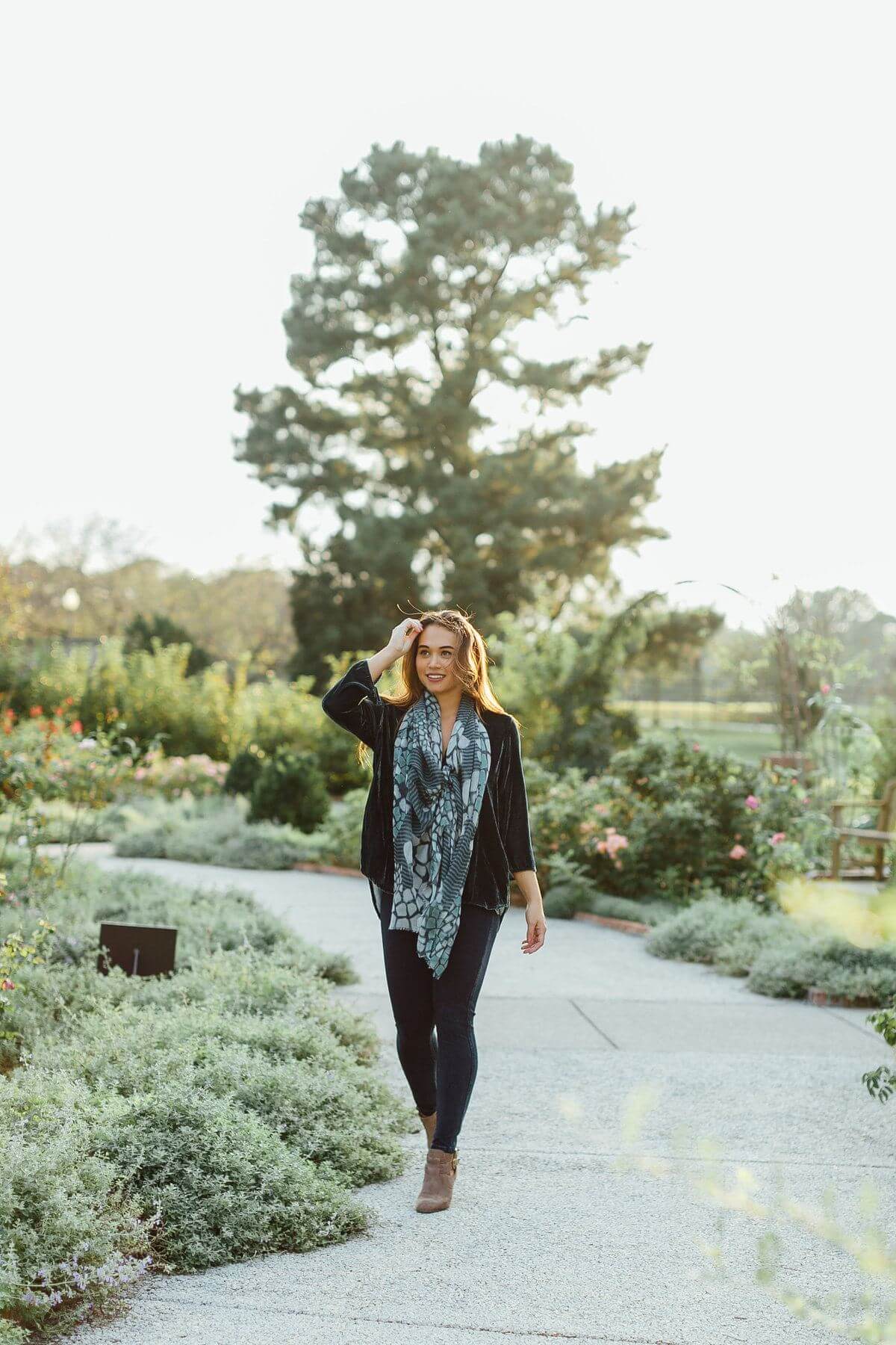 On Christi, from Coming Attractions: CP Shades Velvet top, $185; Asian Eye scarf, $; Yochi felt earrings, $52; Lysee denim leggings, $110