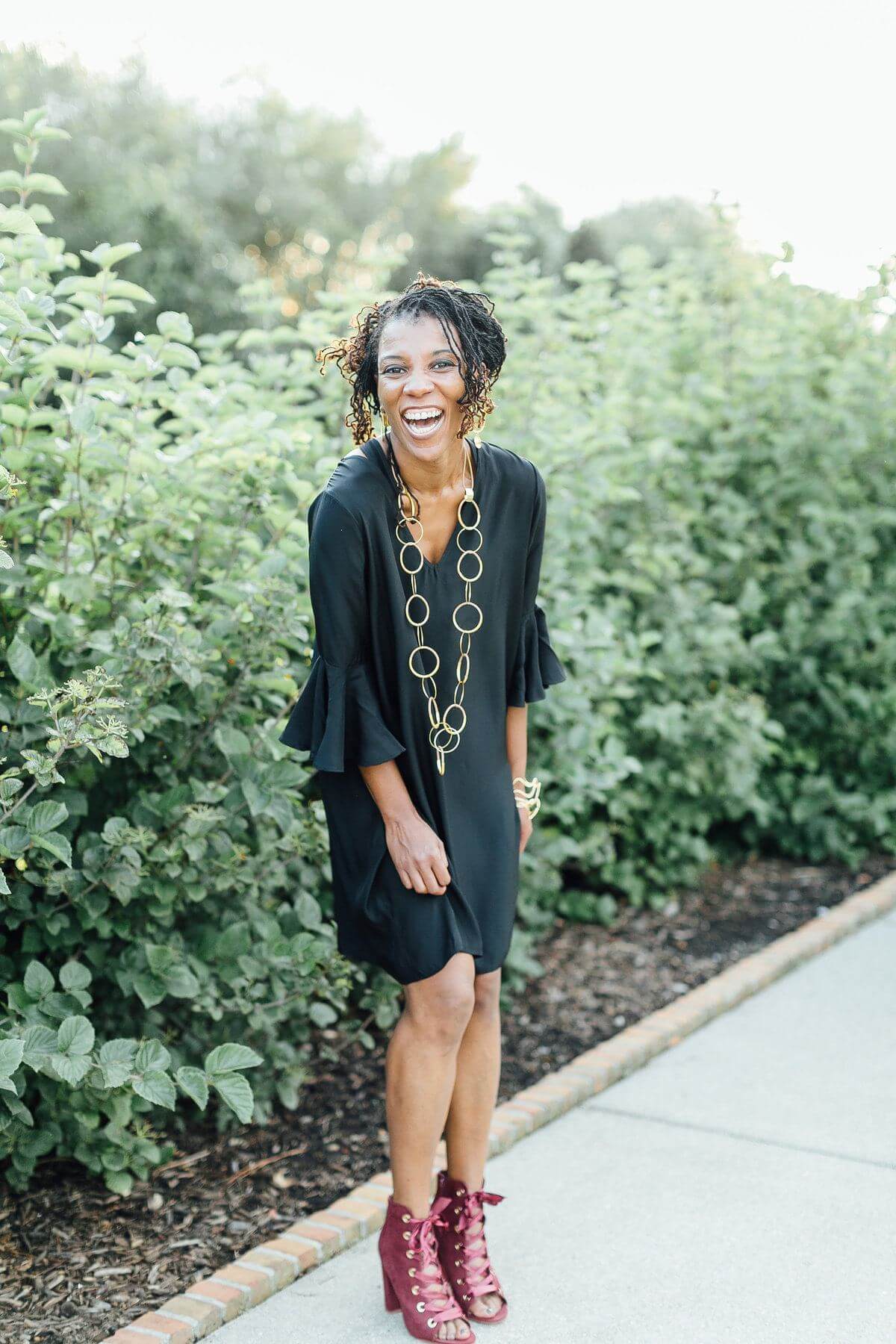 On Stephanie, from Coming Attractions: La Roque black dress, $278; Zzaan necklace, $155; Zzaan bracelets, $110; Gold earrings $80
