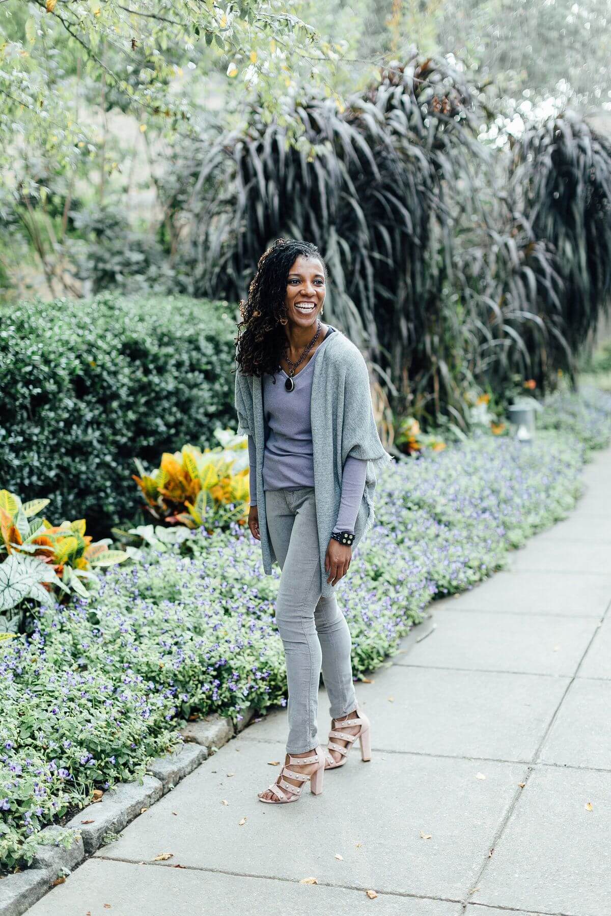 On Stephanie, from Southern Muse: Joy Joy gray fringy cardigan, $102; Chaser wisteria scoop neck top, $53; James Jeans pearl gray legging, $172; Catherine Page cie earring, $63; zoWee amethyst necklace, $147; Beaded leather bracelet, $35