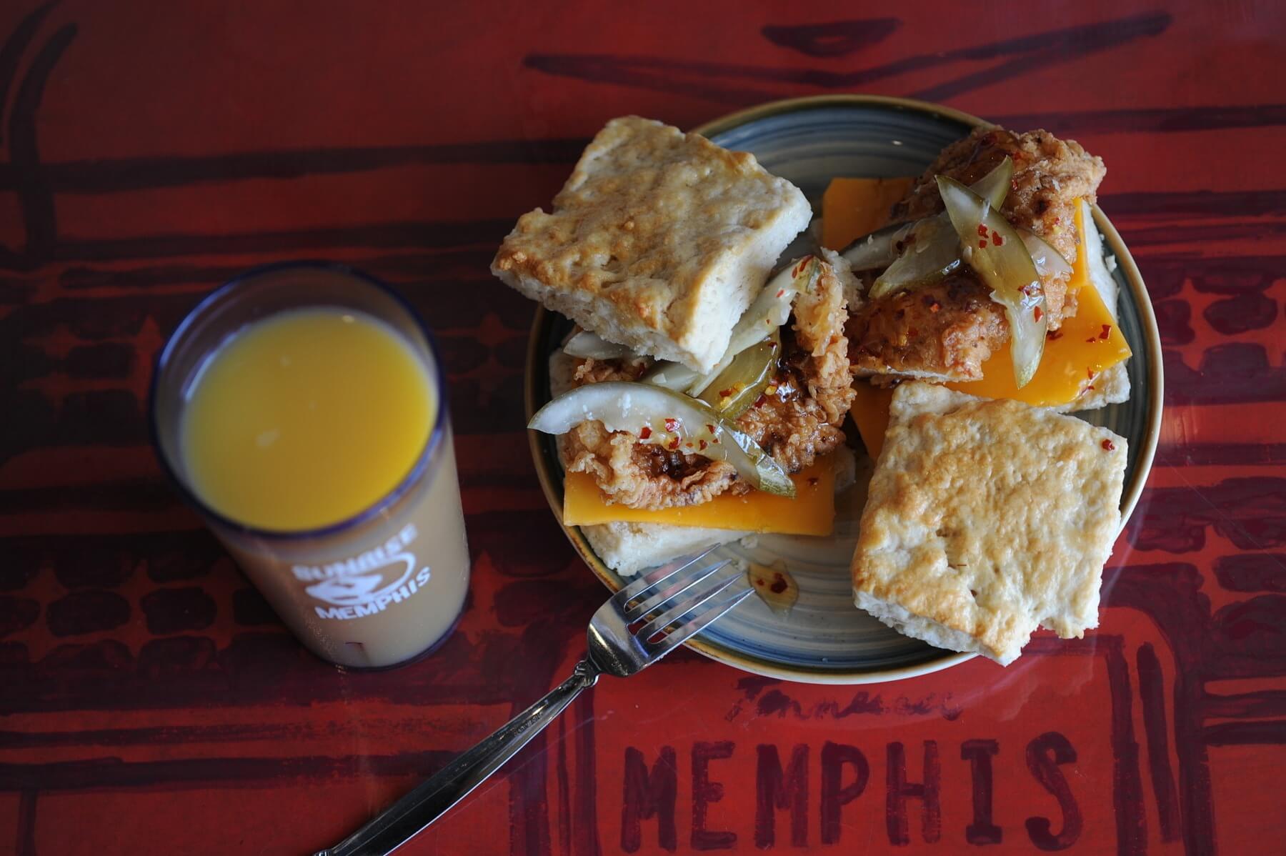 The Rooster biscuit features a crispy piece of fried chicken, house-made pickles and Tabasco honey, served on a freshly baked buttermilk biscuit. Add an egg for a “Mother and Child Reunion”! Image: Sunrise Memphis Sunrise Memphis
