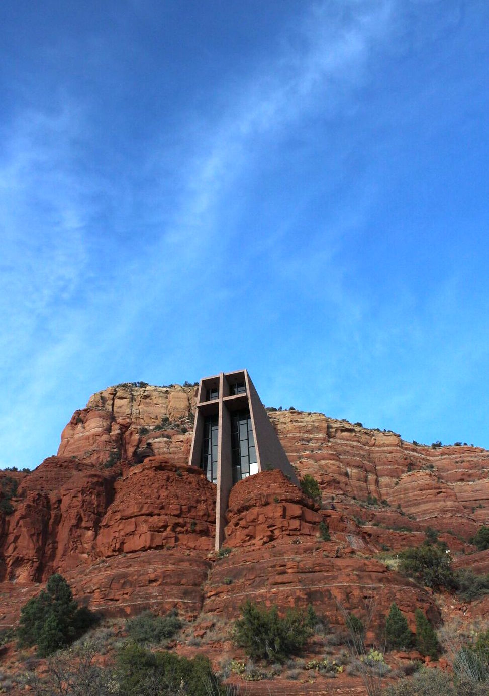 The Chapel of the Holy Cross is a Roman Catholic church built into the buttes of Sedona, and well worth a trip to walk the quarter-mile or so up from a parking area to see the inside, as well as dramatic views of Sedona from the church itself. Image: Alex Mowry Arizona vacation itinerary
