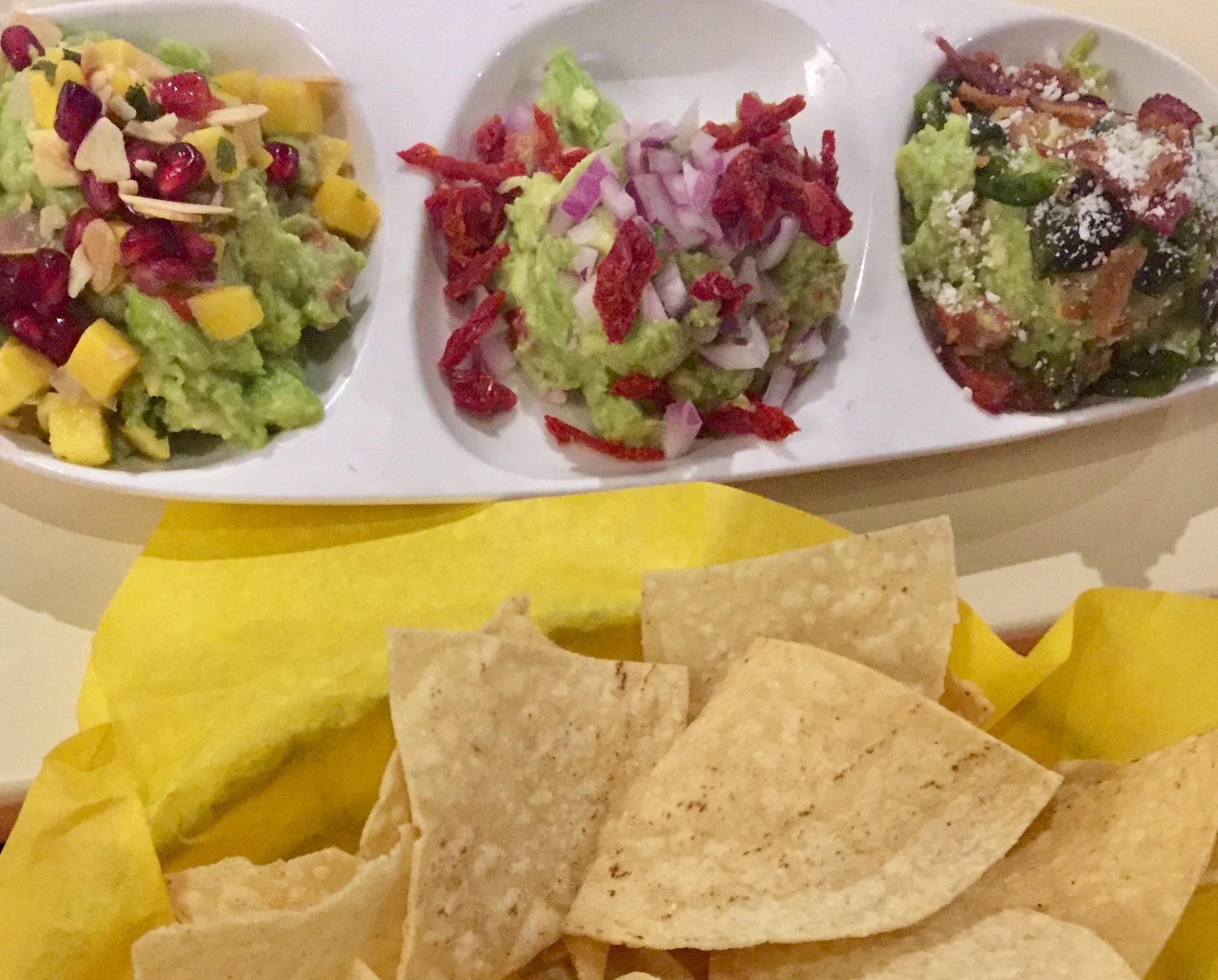 Guacamole three ways at 89 Agave: lime and sun-dried tomato; with bacon and cojito cheese; and avocados blended with mangos, pomegranates, and almonds. Lisa Mowry Arizona vacation itinerary