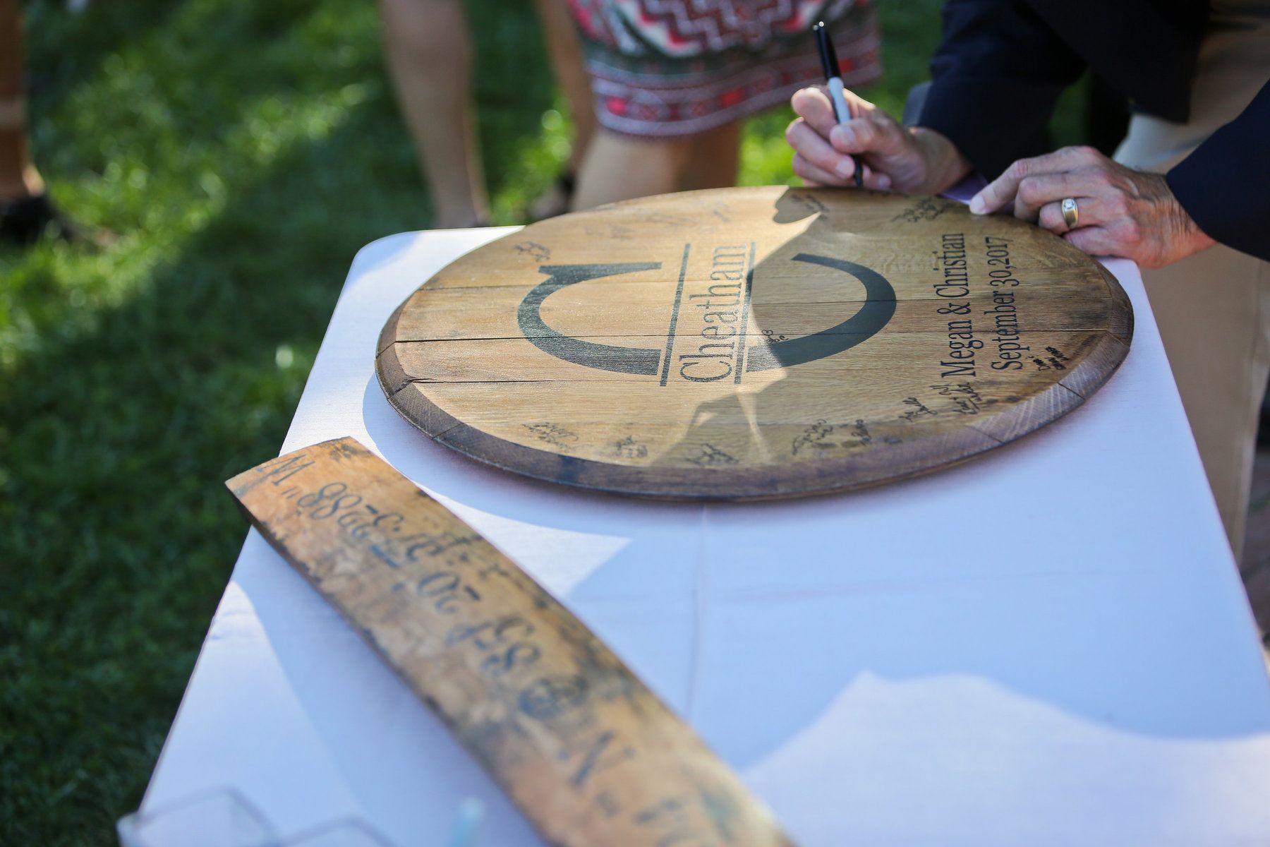 The Cheatham’s guestbook was a bourbon barrel top! They also displayed a bourbon barrel stave with the coordinates of the gorgeous venue Richwood on the River. Richwood on the River