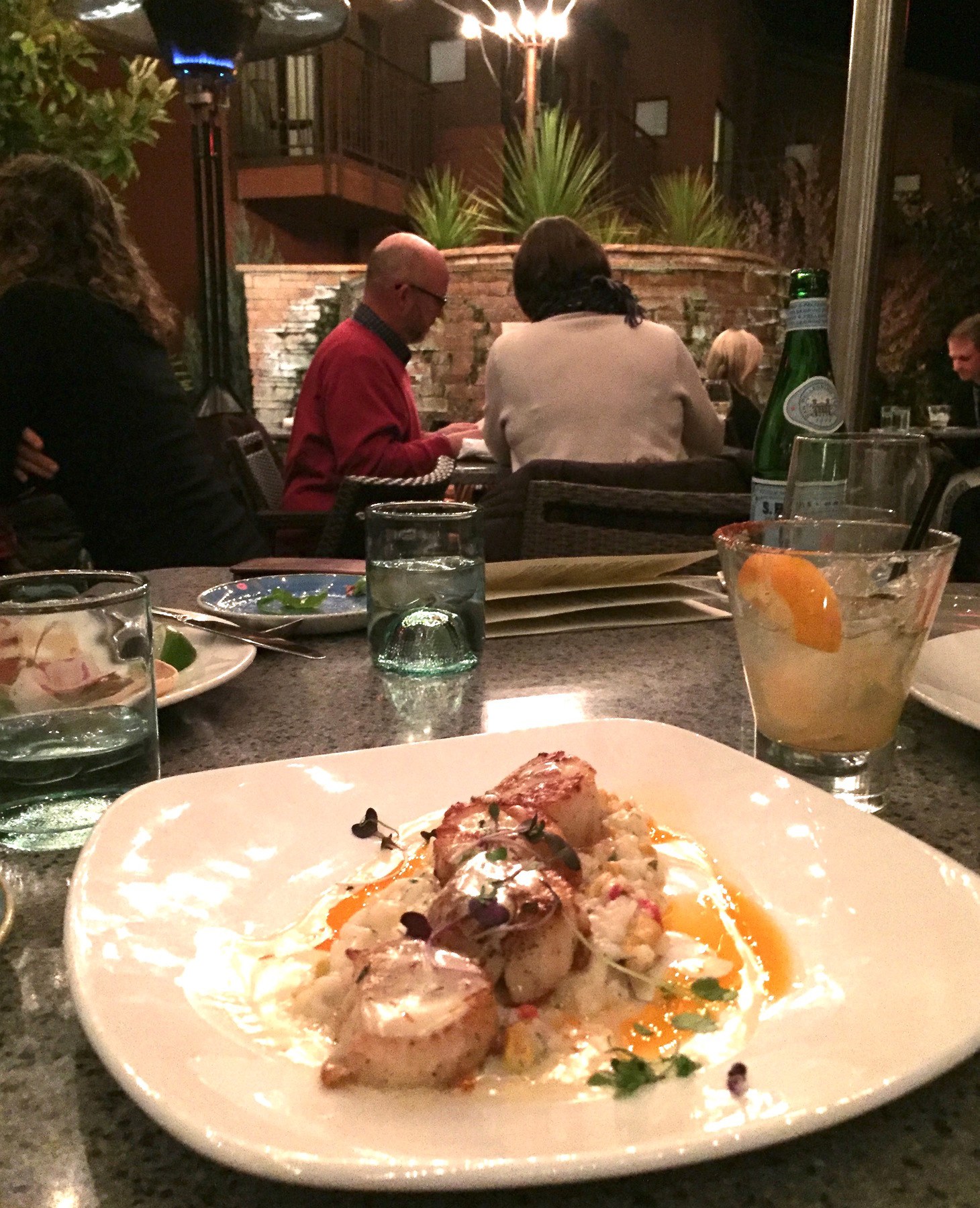 Pan-seared diver scallops on corn risotto benefit from a little tequila sauce—not to mention the specialty margarita—at Salt Rock restaurant. Lisa Mowry Arizona vacation itinerary