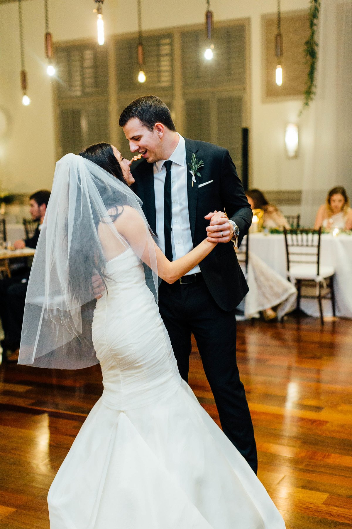 The bride and groom’s first dance was to a song special to both of them — “ILYSB” by the band LANY.