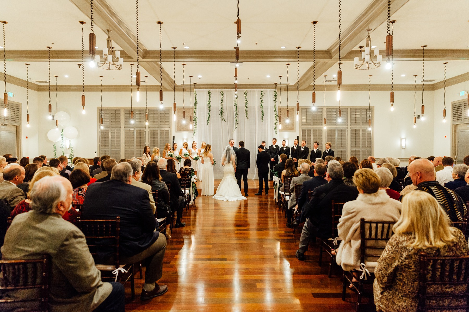 NOAH’s Event Venue was a simply elegant location for the ceremony and the reception. “I loved how customizable the setup was, between their many lighting options, tables settings, and chairs," says Taylor. "It was all was included, and it was beautiful!”