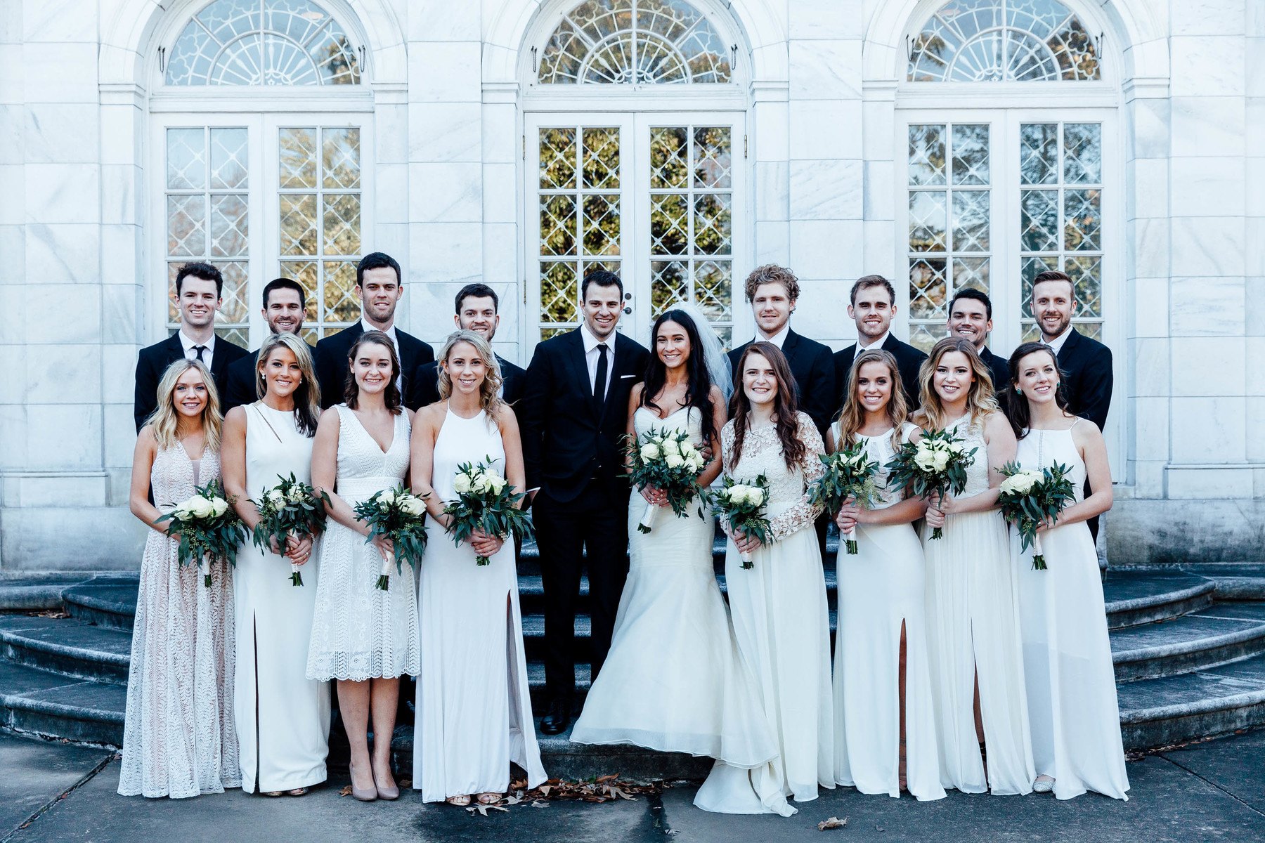 Although an unconventional color palette, this black-and-white wedding party exudes stylish elegance.