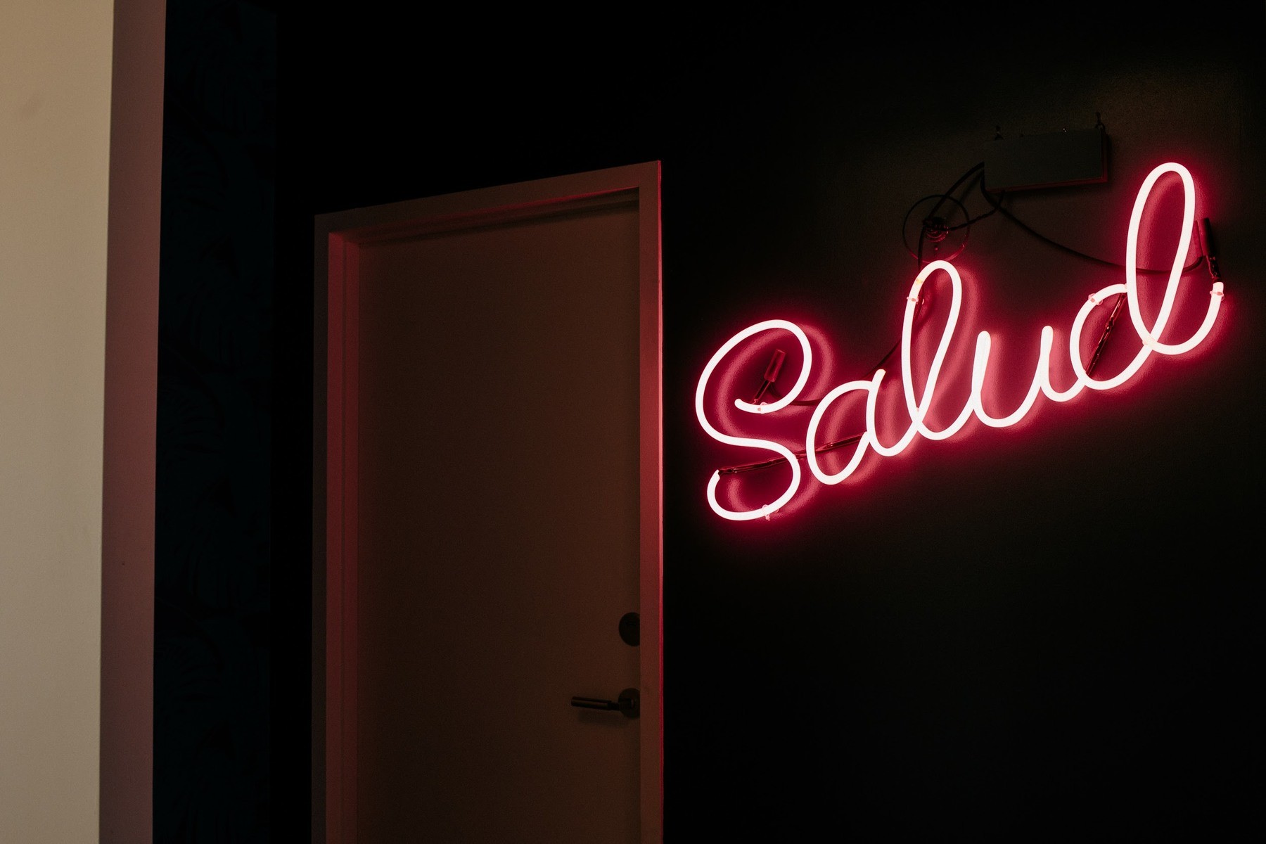Splashes of custom neon give The Liquor Store a retro vibe. Image: Joram Mondie The Liquor Store