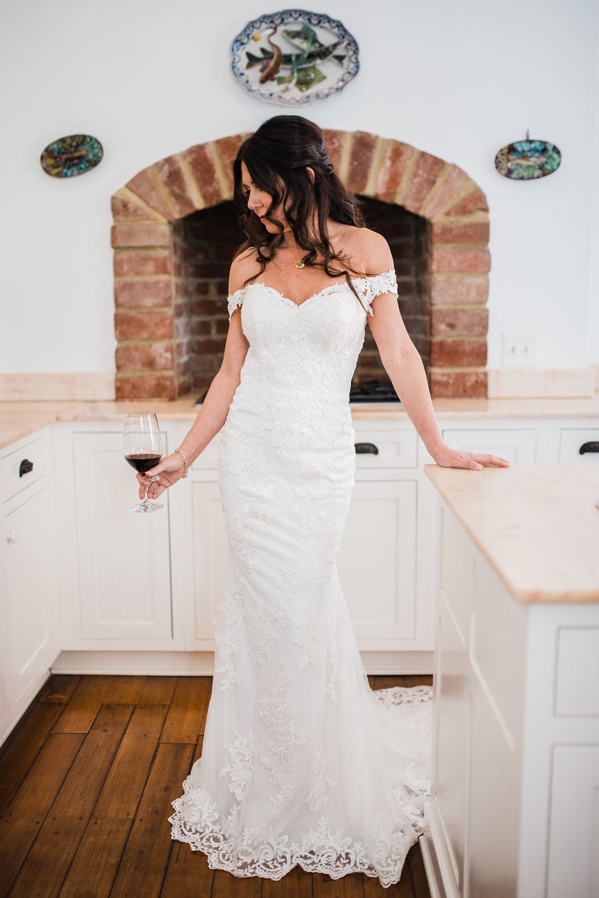 Anissa is wearing a romantic off-the-shoulder Lillian West ivory lace gown, $1,530, from Couture Closet. What to Wear Louisville February