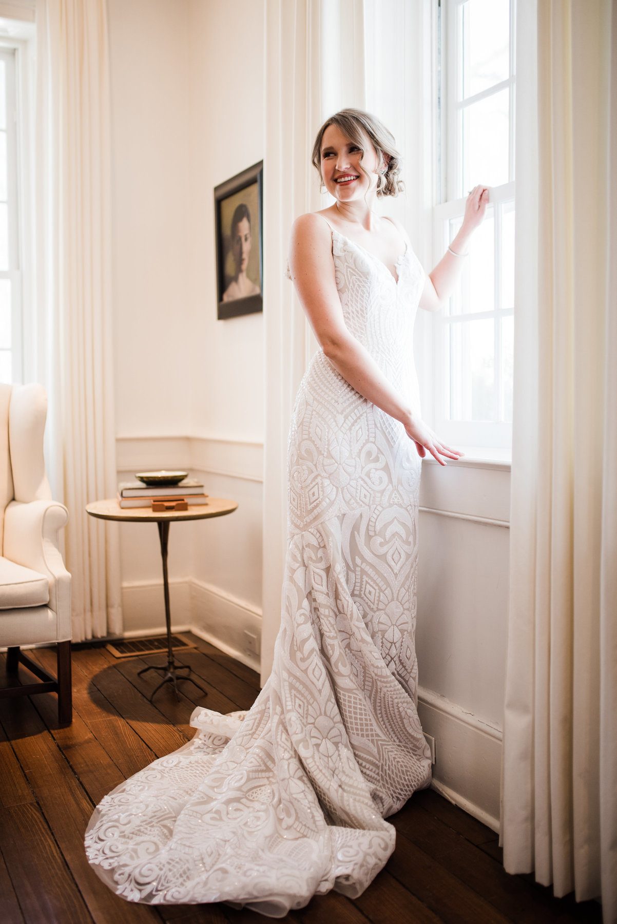 Oksana is wearing a Blush by Hayley Paige ivory/cashmere sequin lace gown, $2,970, from Couture Closet. What to Wear Louisville February
