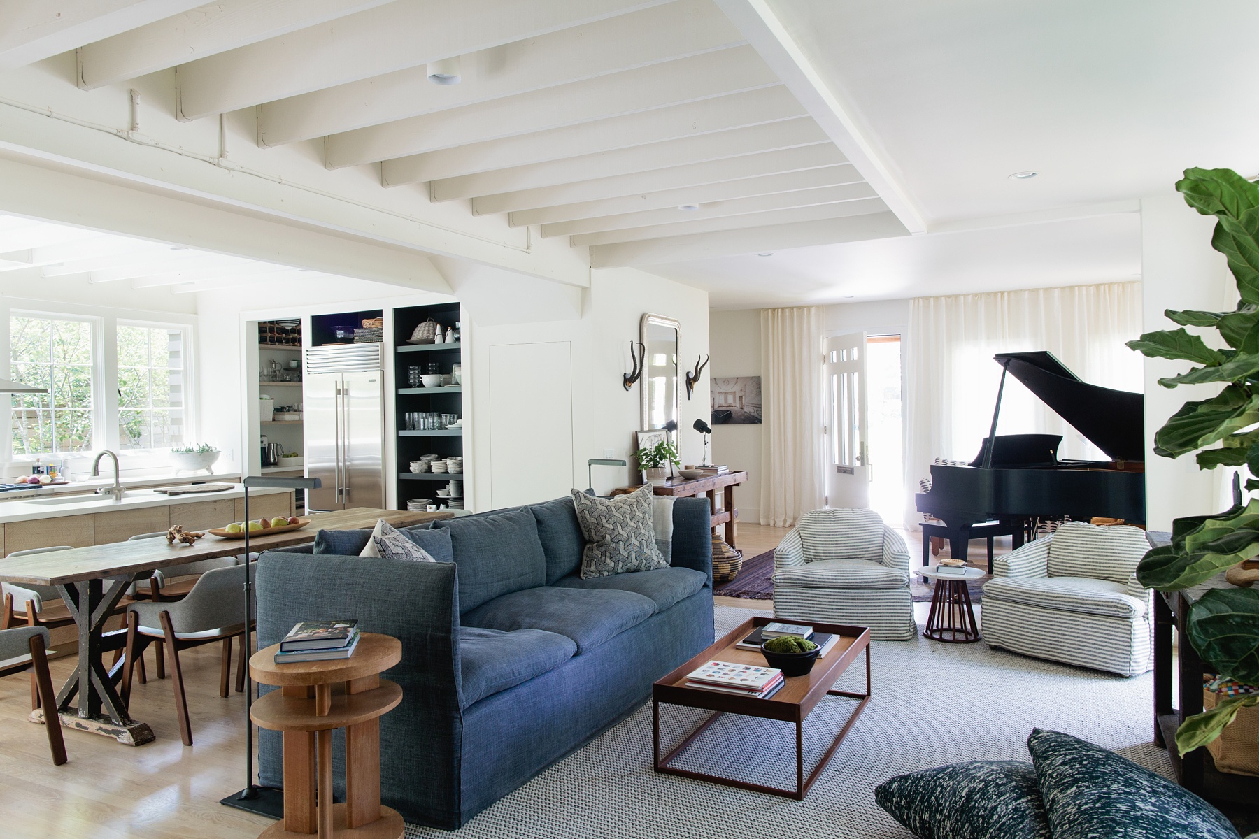 “The architect and homeowners and I worked together on building and decorating their first house, so we already had a great working relationship. It was fun and exciting to reinterpret this family in a new and different way from the first house and see their family, and thus their dwelling evolve to reflect who they are,” says Fran. “Their goals were different in this house, they wanted simpler, smaller, and now that their family was more established, they knew more how they wanted to live.” Scandinavian-style family home
