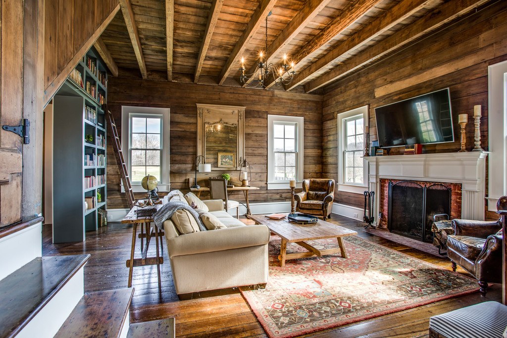 The family room is filled with warm, rich tones to create an inviting and cozy retreat.