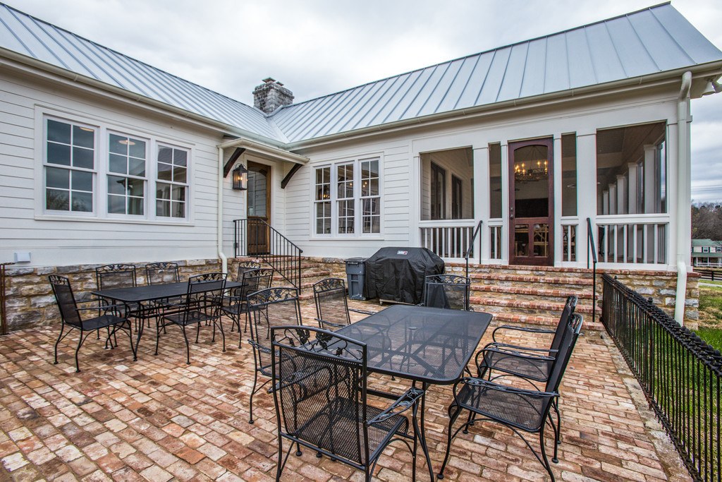 The wrought iron fencing separating the brick patio from the yard was from the Belle Meade Mansion.
