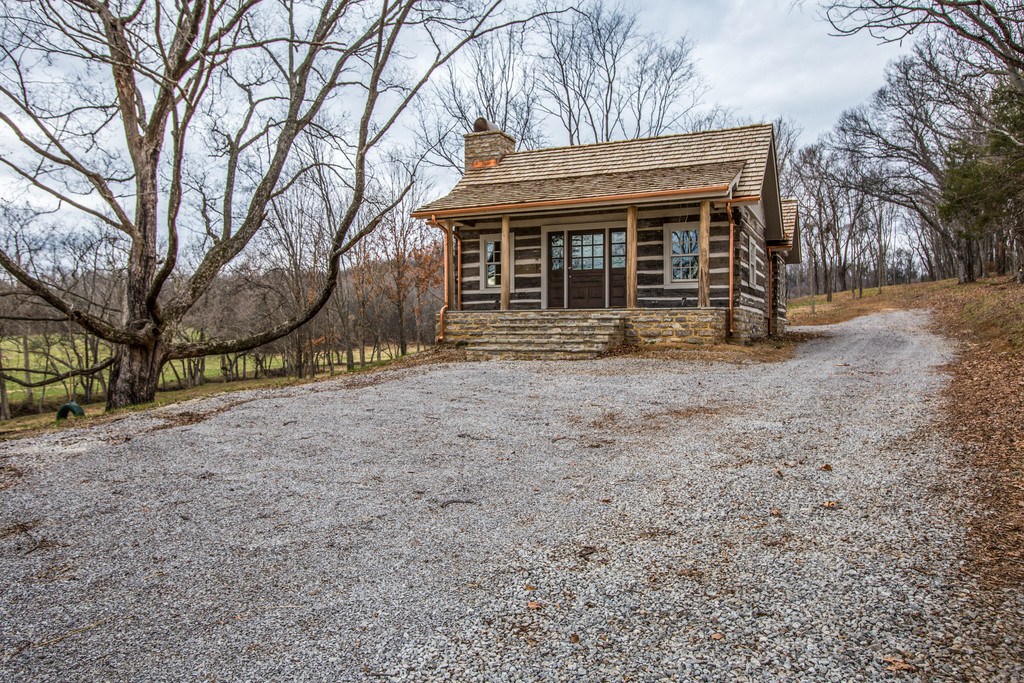 Doug purchased, dismantled and reassembled this log cabin, which sits not far from the main house. 
