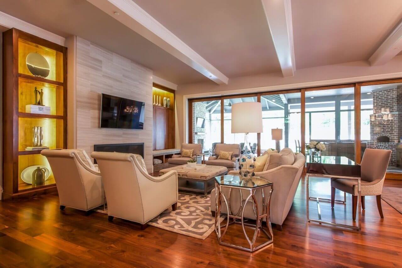 A geometric rug from The Rug Company anchors the otherwise neutral elements in the living room.