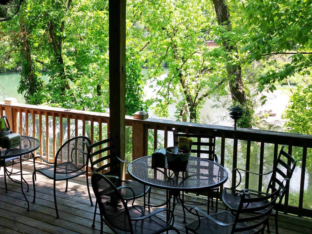 The partially covered patio at Papa Saia's overlooks the Buck Creek falls through a gentle tapestry of leaves.