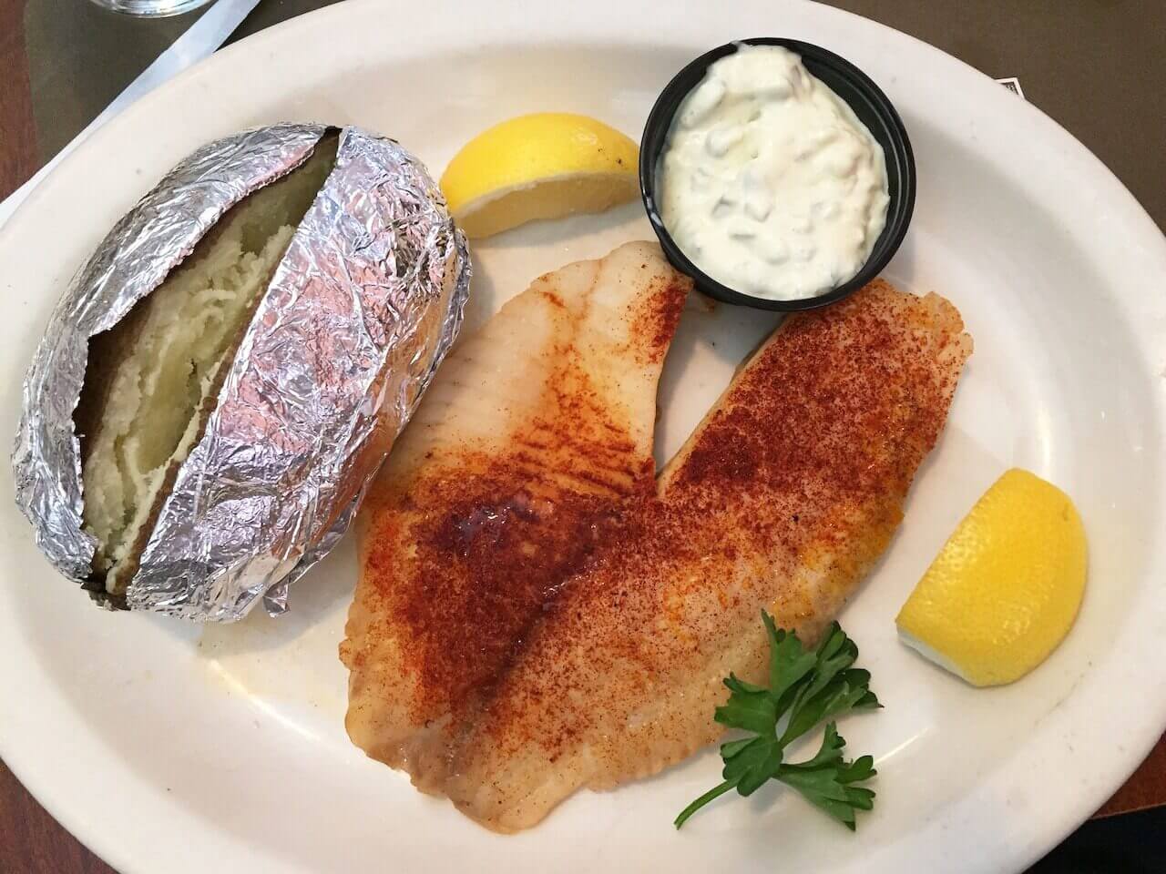 The tilapia is so good and comes with a choice of two sides: I went with the baked potato and the cucumber salad (which was devoured in under 1 minute).