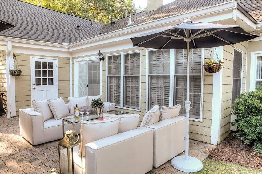A bottle of wine always matches any decor style Julie Dewald's own backyard follows helpful outdoor decorating advice.