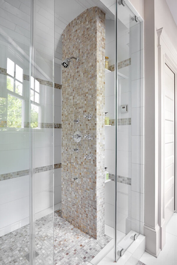 The intricate tilework both on the floor and on the walls and ceiling are astounding. Glitzy atlanta bathroom