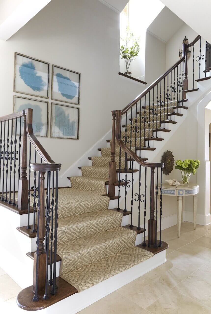 Libby used a diamond sisal runner for the stairs in this beach house foyer. "I love using natural fibers in a setting like that," she says. Libby used a diamond sisal runner for the stairs in this beach house foyer. "I love using natural fibers in a setting like that," she says.