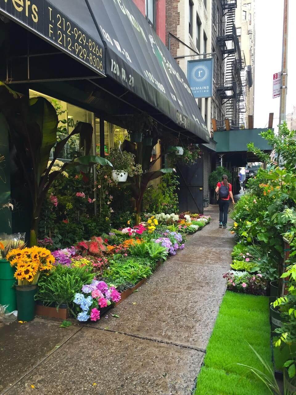 In the heart of Chelsea, 28th Street features one business after another selling plants and flowers. The bustle of Chelsea flower market is best in the morning, when delivery trucks bring fresh blooms.