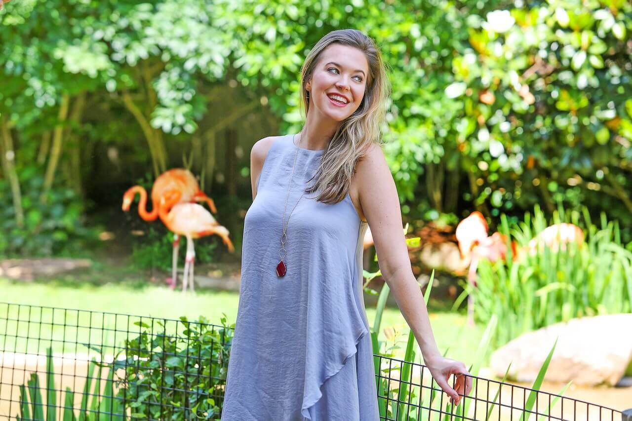 A breezy dress and a statement necklace make summer style simple.