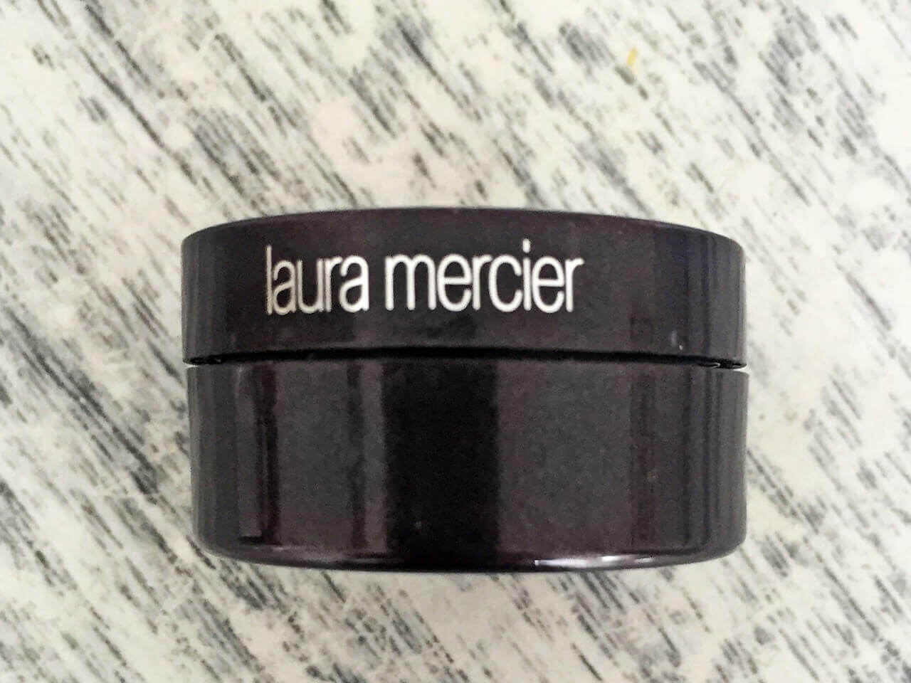 One of Kerri's favorite products, Laura Mercier Secret Concealer, conceals discolorations and dark circles. 