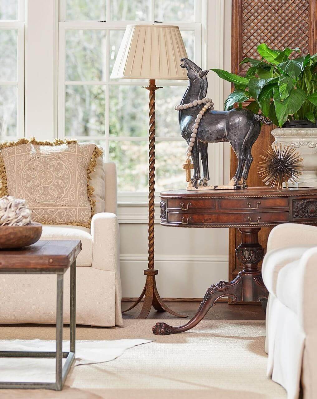 An antique table adds the patina of old wood to the family room.