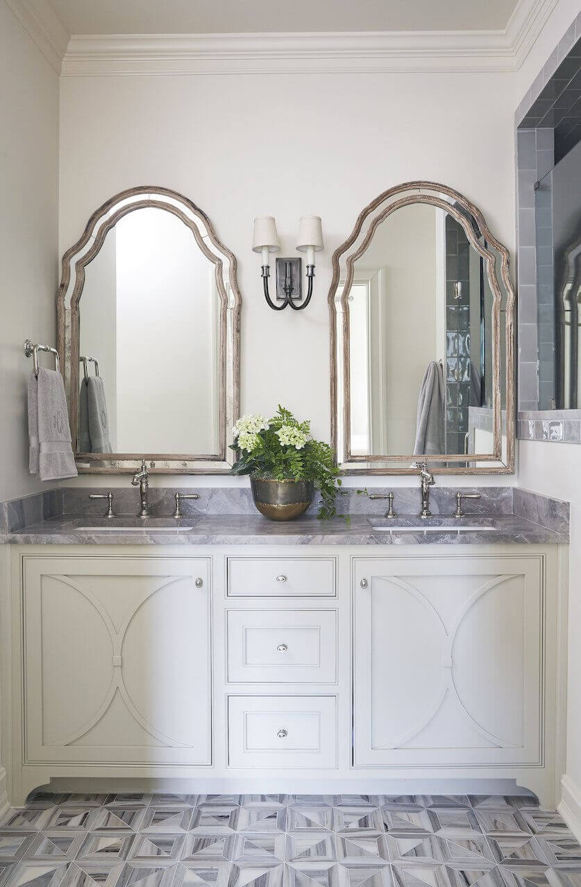 "You can always dress up your cabinets by adding a design on front of doors," says Libby. The floors are a geometric mosaic honed marble from Fixtures and Finishes. "You can always dress up your cabinets by adding a design on front of doors," says Libby. The floors are a geometric mosaic honed marble from Fixtures and Finishes.