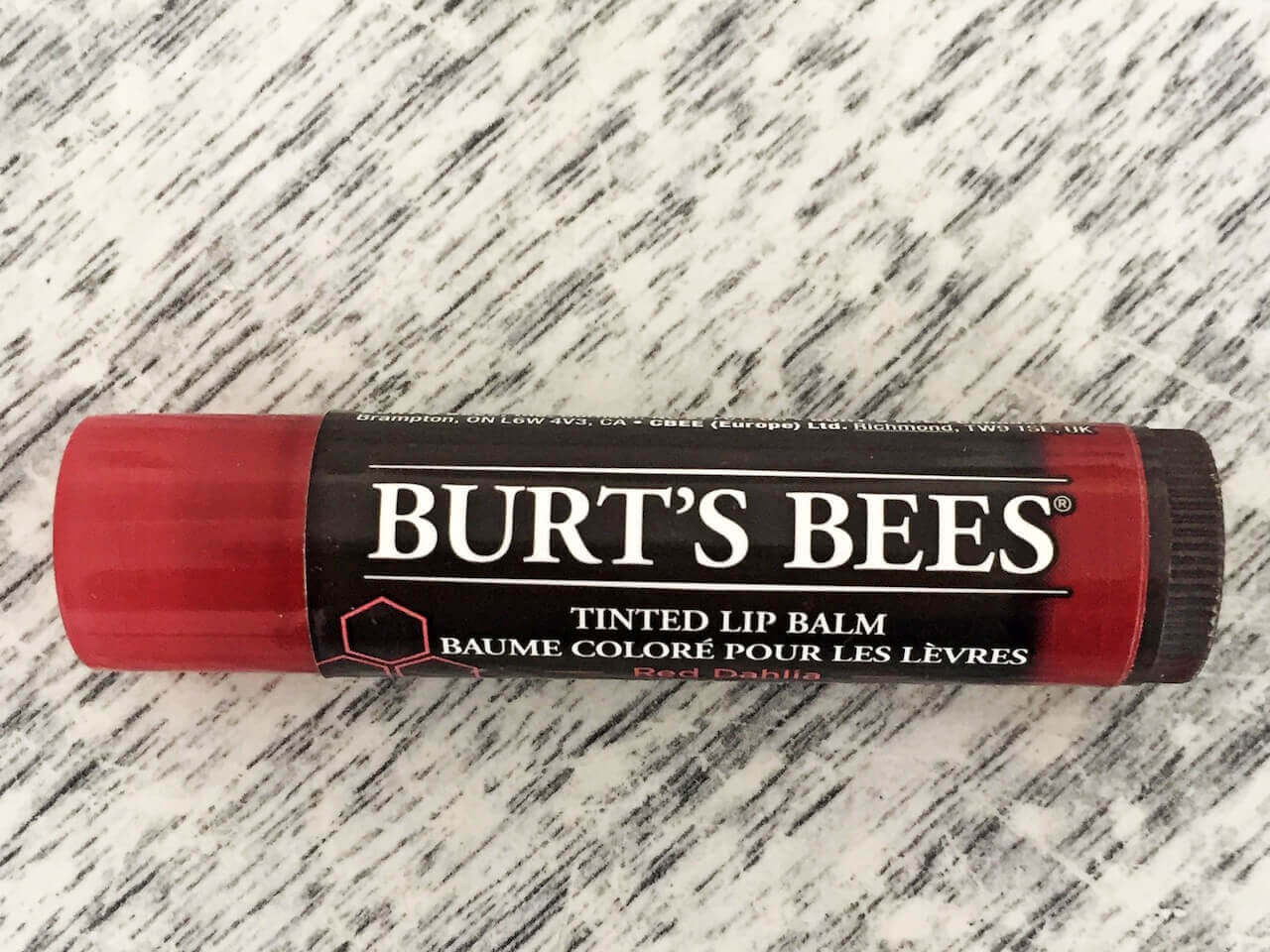 Burt's Bees Tinted Lip Balm nourishes skin with a natural mix of Shea butter and botanical waxes.