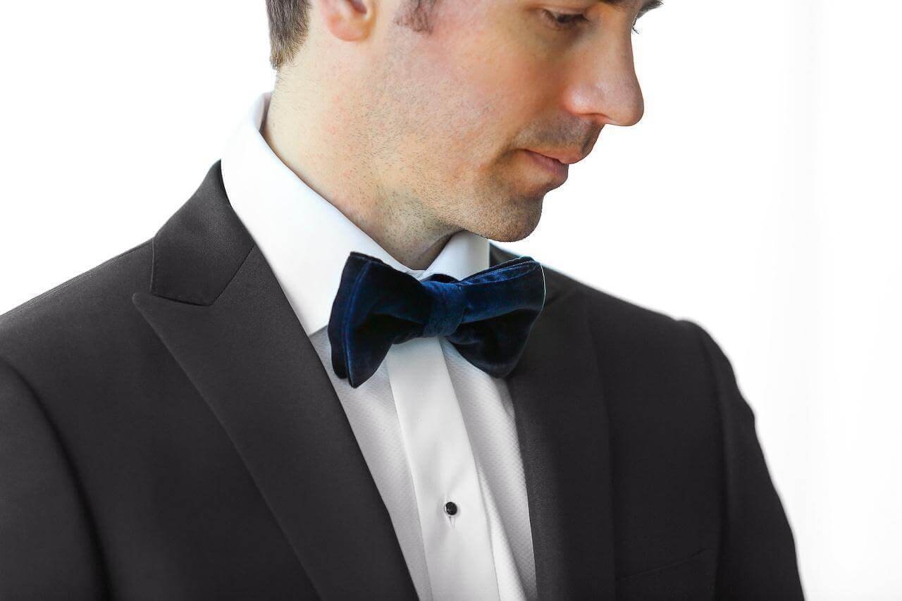 A velvet bowtie is a great way to update your standard tuxedo.