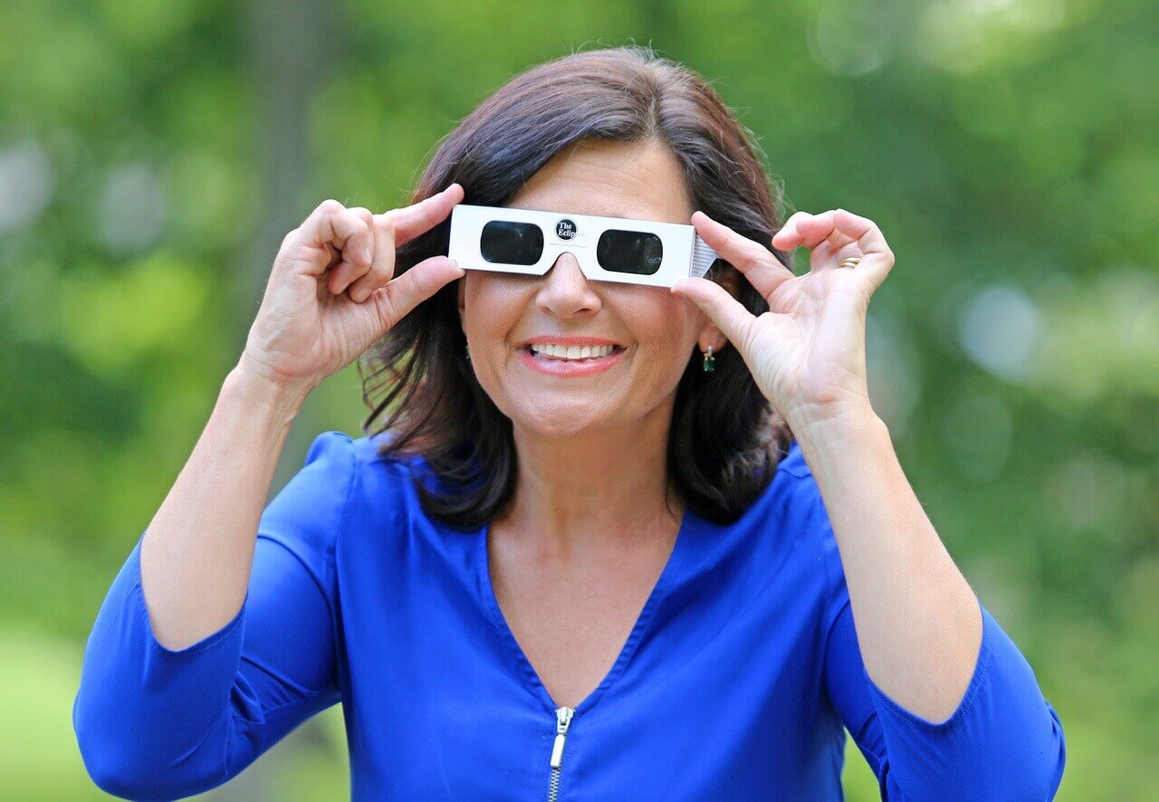 Janet's never without a hefty supply of eclipse safety glasses, and she's quick to share them with anyone she meets.