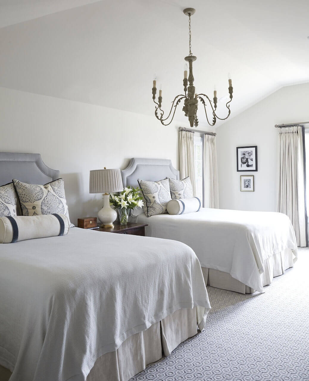 With its soft, velvet upholstered headboards and hand-painted euro shams, this guest bedroom provides ample sleeping for this home away from home. Libby found vintage press photos of Coach Bear Bryant and other historical images that add personality and local flavor throughout the home. With its soft, velvet upholstered headboards and hand-painted euro shams, this guest bedroom provides ample sleeping for this home away from home. Libby found vintage press photos of Coach Bear Bryant and other historical images that add personality and local flavor throughout the home.