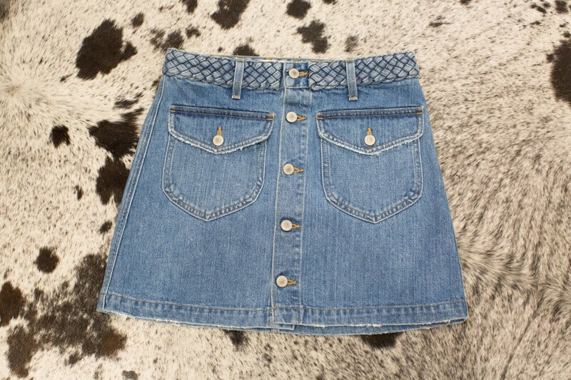 The fun details pf this Tularosa skirt make this skirt a must for summer concerts. $138 at Baer's Den