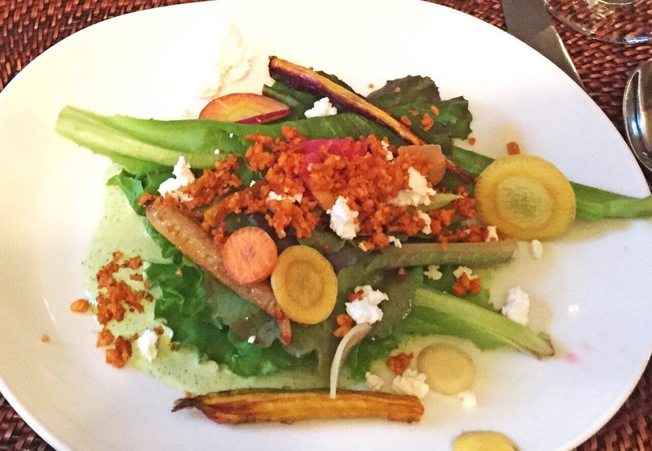 An evening salad is full of vegetables from the local gardens.