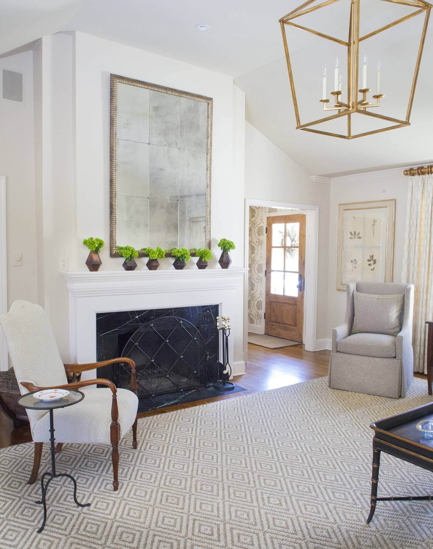 Subtle pattern on the living room rug adds interest while keeping with the room’s neutral palette. Designer Cindy McCord used soft, neutral hues throughout the entire home, changing its mood and vibe to one of relaxed elegance. Cindy McCord
