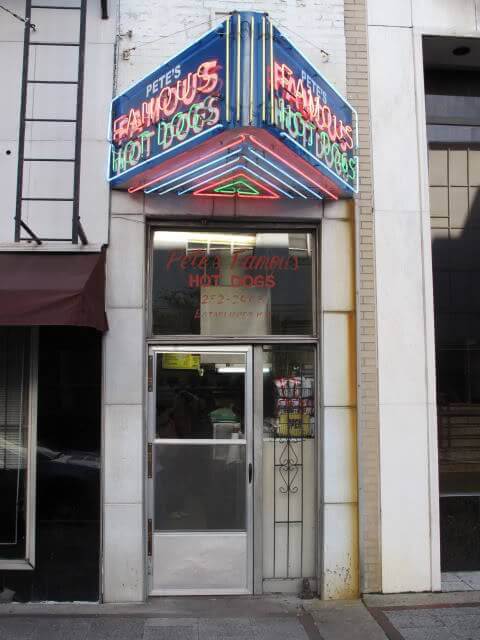 The iconic neon sign, bought for $500 by Gus' uncle Pete, was donated to the Birmingham History Center in 2011 after the eatery closed. Image: roadfood.com