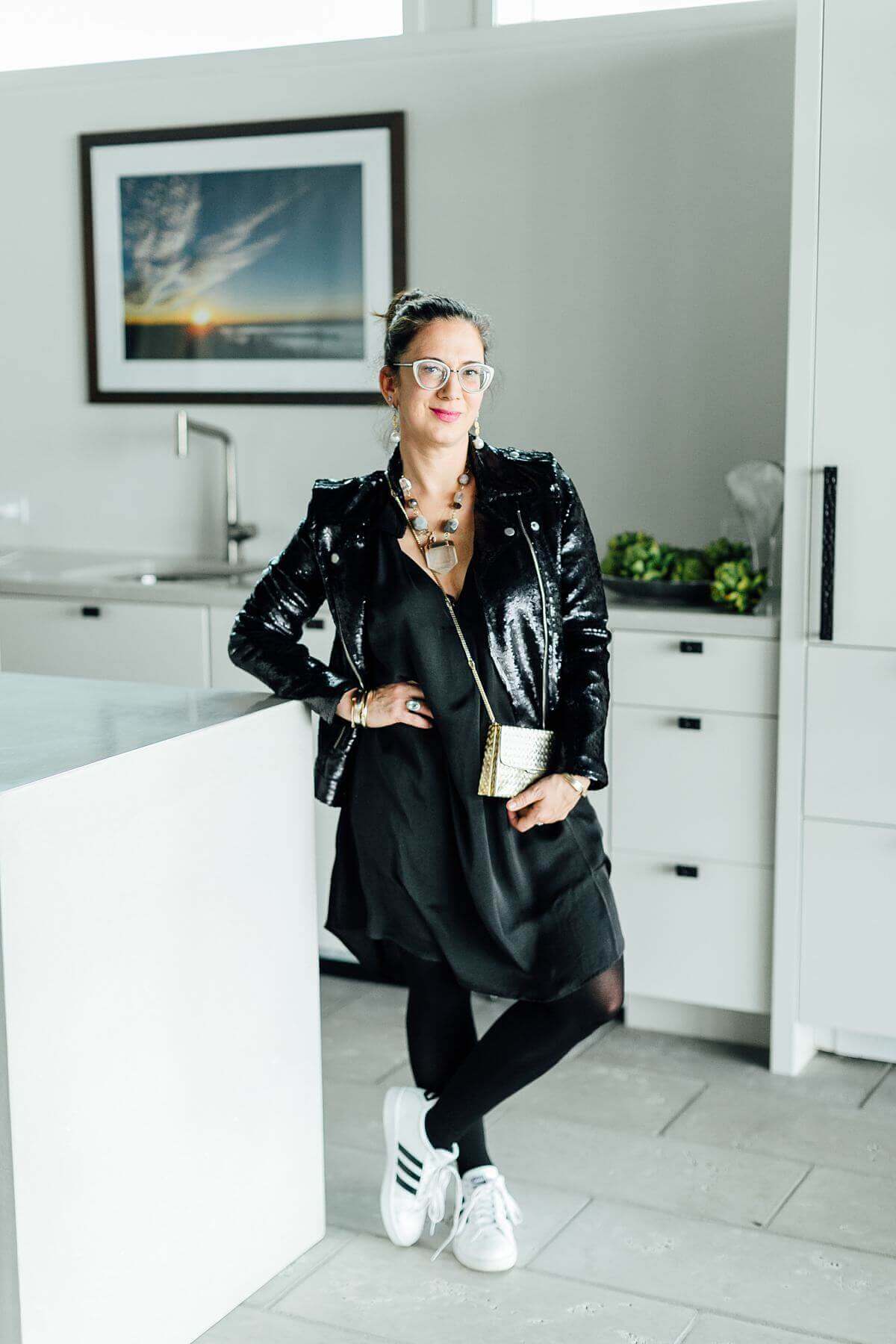 On Augusta: Black sequin moto jacket from Lori James, $378; Payslyn dress from Sachi, $118.