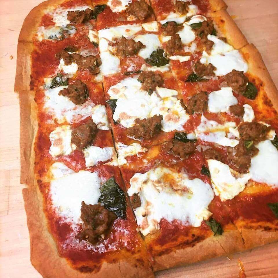 Sicilian pan pizza by the slice, $2.75, from Sarino Cheap Eats Louisville