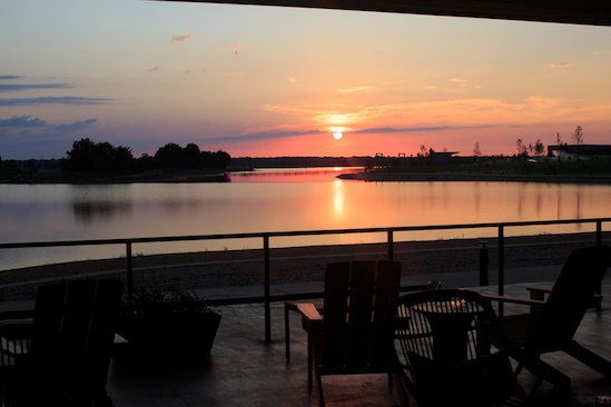 Sunset from the patio at The Kitchen, overlooking Hyde Lake. Sunset from the patio at The Kitchen, overlooking Hyde Lake.