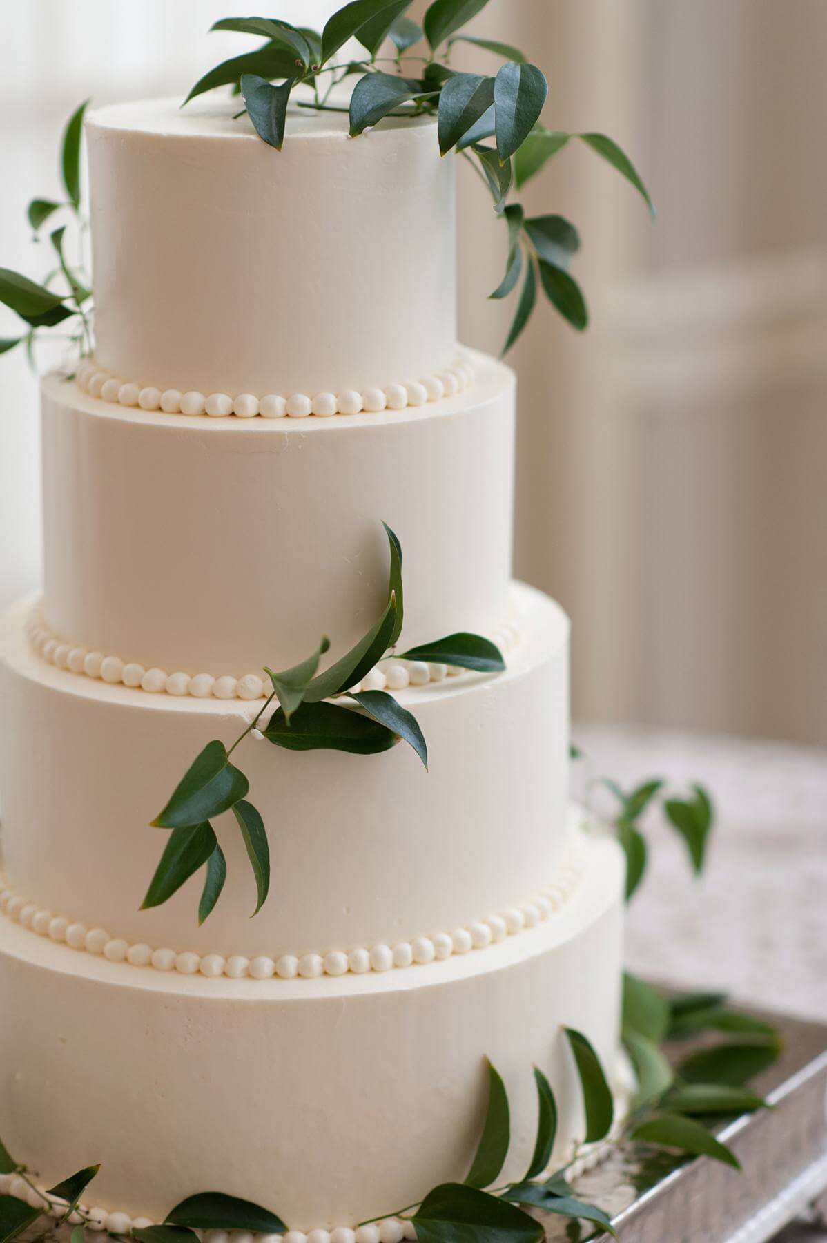 For their cake, Clem and Charlie each selected a flavor — Clem’s was almond wedding cake with raspberry filling, and Charlie’s was death by chocolate.