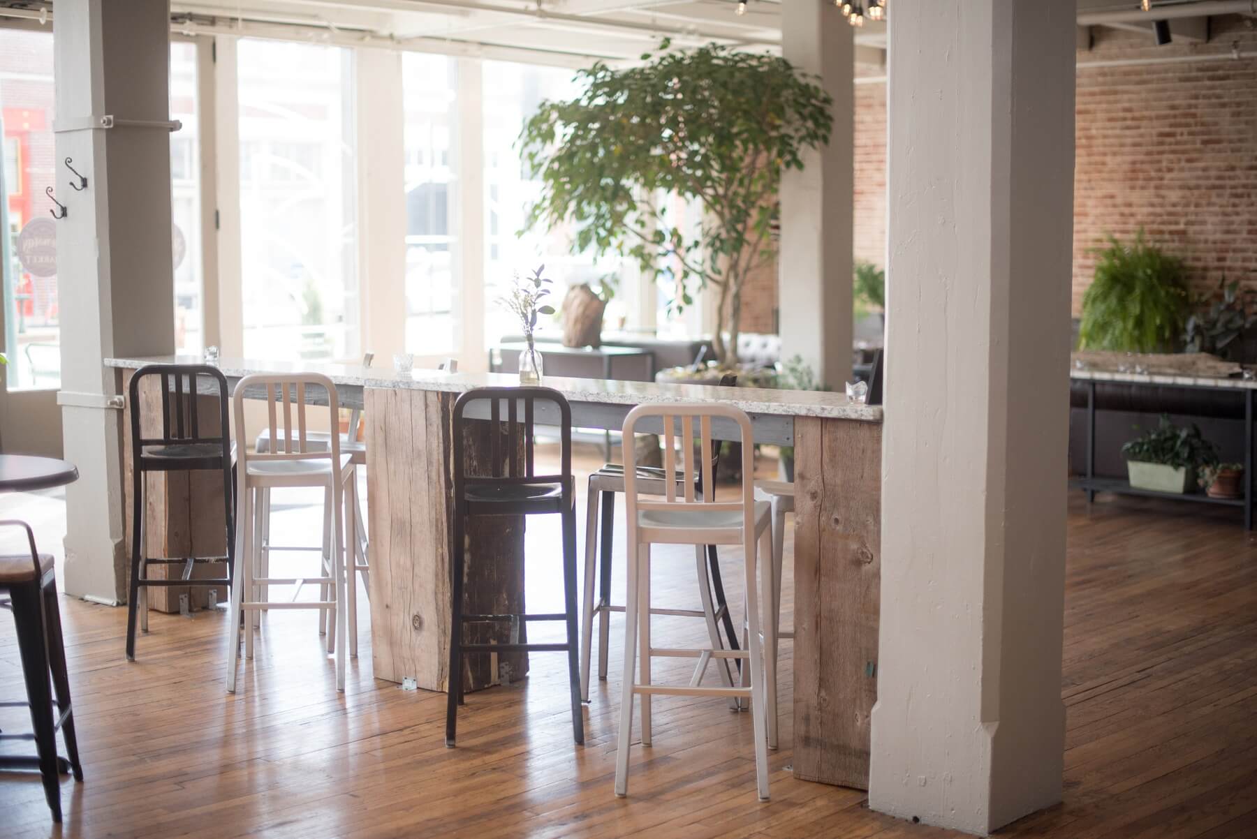 The South Main Market is the perfect neighborhood gathering spot. We love this seating area! Image: Creation Studios for The South Main Market
