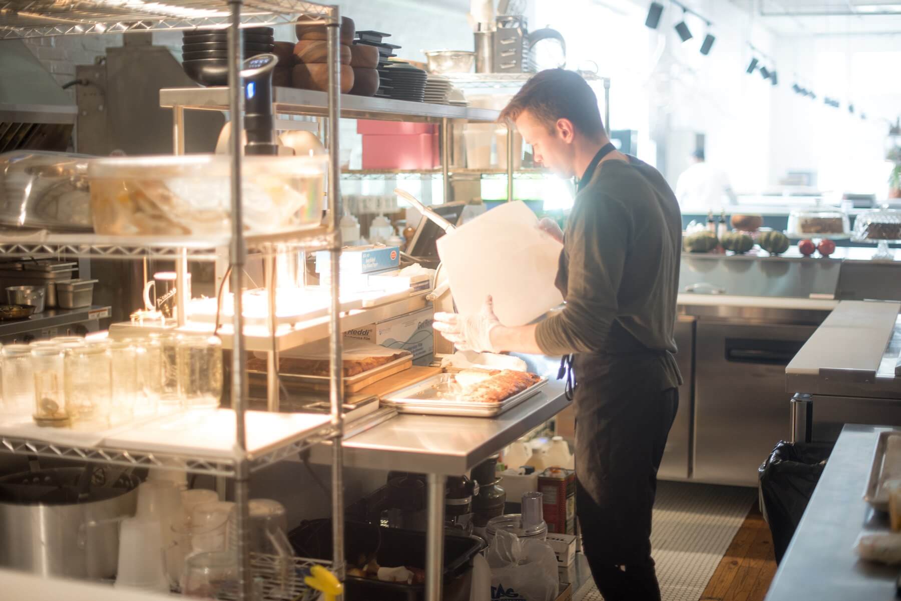 Chef Cole Jeanes is busy at work at his restaurant Kinfolk. Image: Creation Studios for The South Main Market