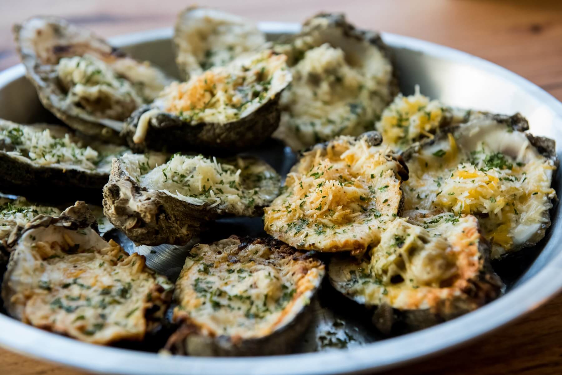Choose either the chargrilled Cajun oysters topped with cheese and Cajun seasoning or the chargrilled three-cheese jalapeño oysters. indian pass raw bar