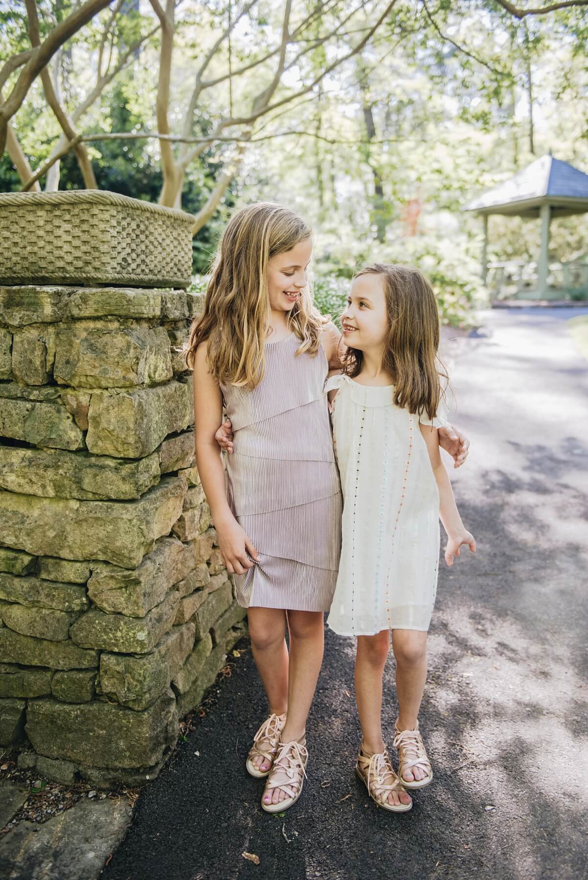 From <a href="https://styleblueprint.com/birmingham/guide/b-kids/" target="_blank" rel="noopener">b.kids</a>: Purple dress, $62; White dress, $68