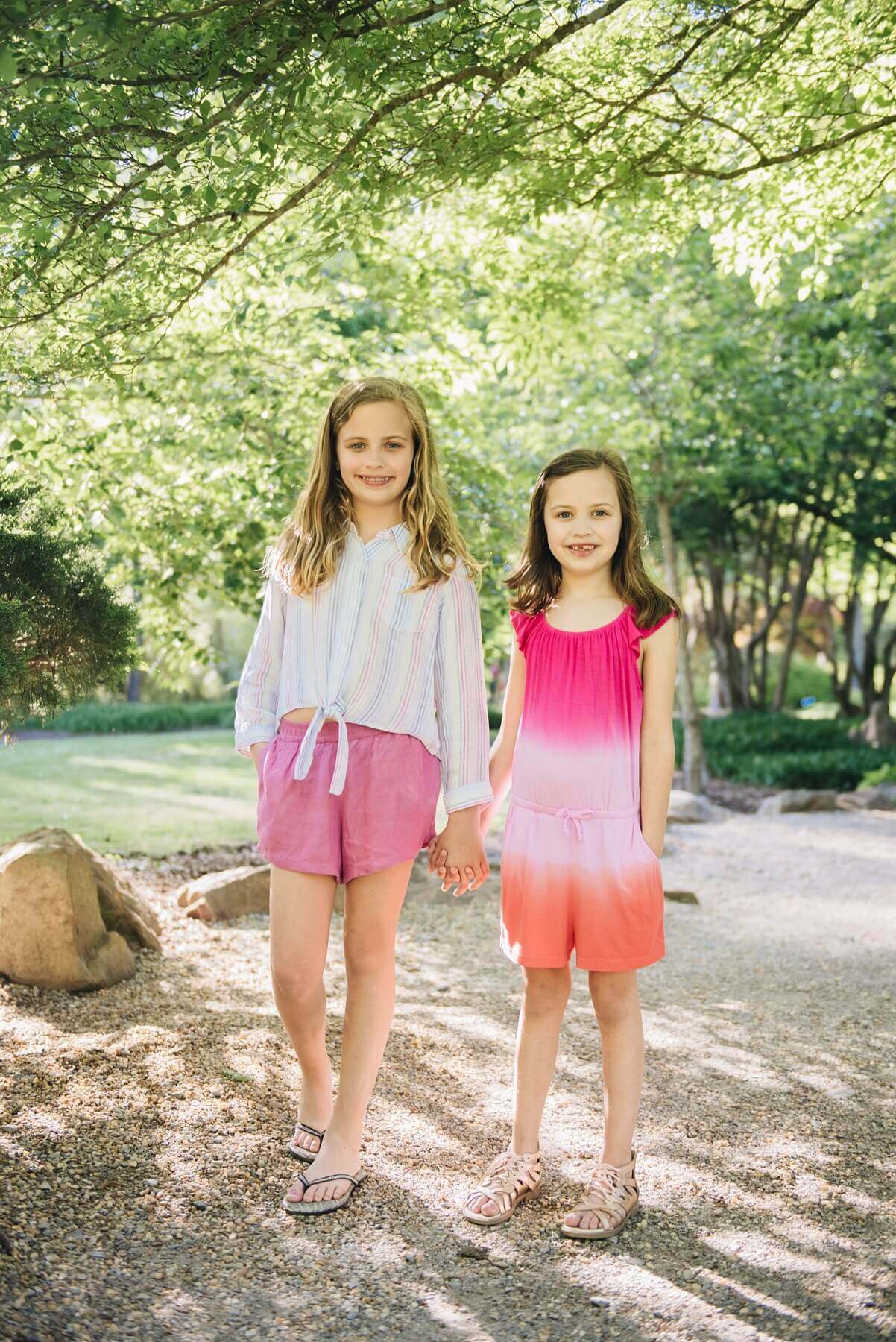 From <a href="https://styleblueprint.com/birmingham/guide/b-kids/" target="_blank" rel="noopener">b.kids</a>: Striped top, $62; Pink shorts, $48; Pink romper, $62