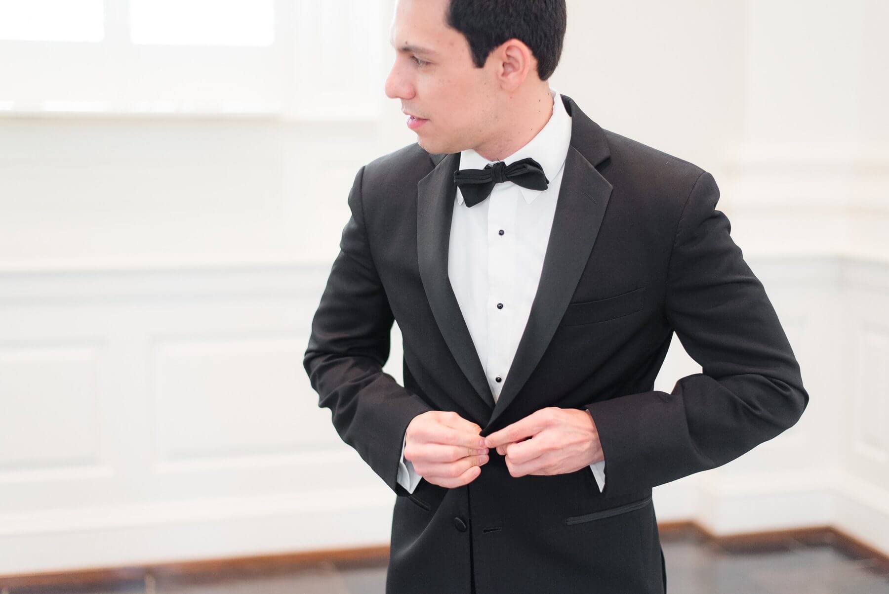 Last minute adjustments before Carlos sees his gorgeous bride!