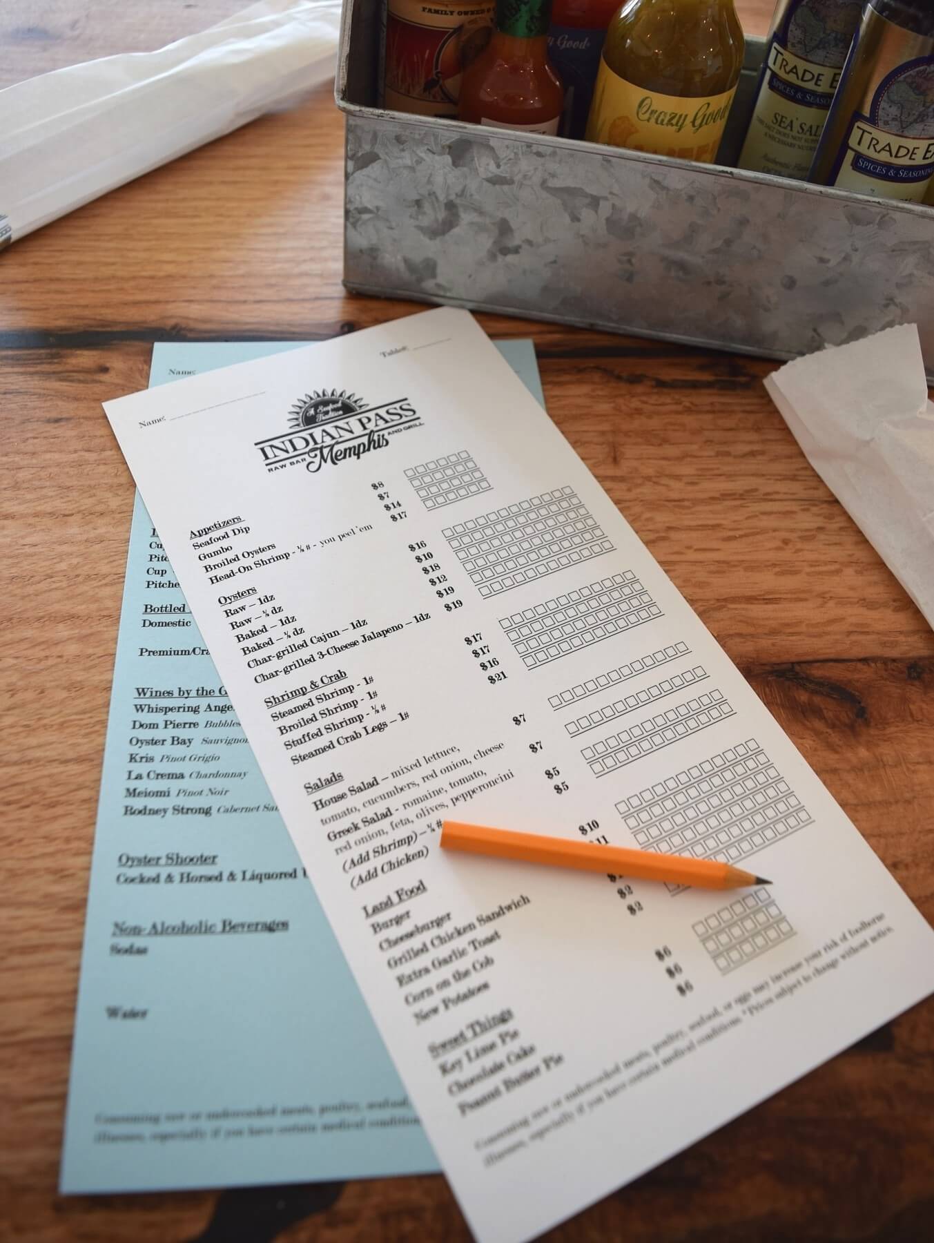 Like at a sushi bar, check off your order and hand it to your server. There’s a score card to keep track of how many beers you enjoy. Image: Jennifer Chandler indian pass raw bar