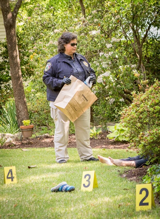 Rest assured, that is not a real body. This is a staged crime scene for the purposes of our shoot, but it's easy to imagine what the real deal would be like, isn't it?