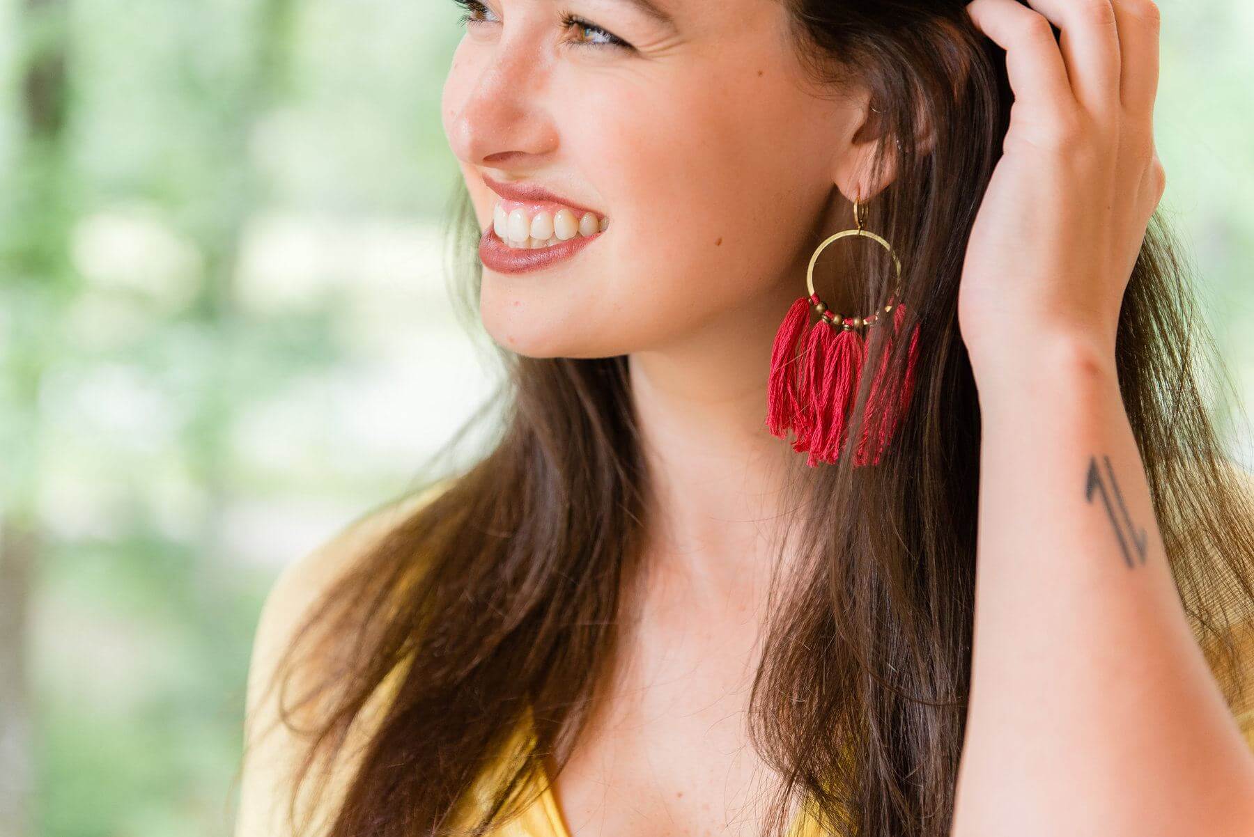 On Taylor from The Clothes Tree by Deborah: Tassel earrings, $12